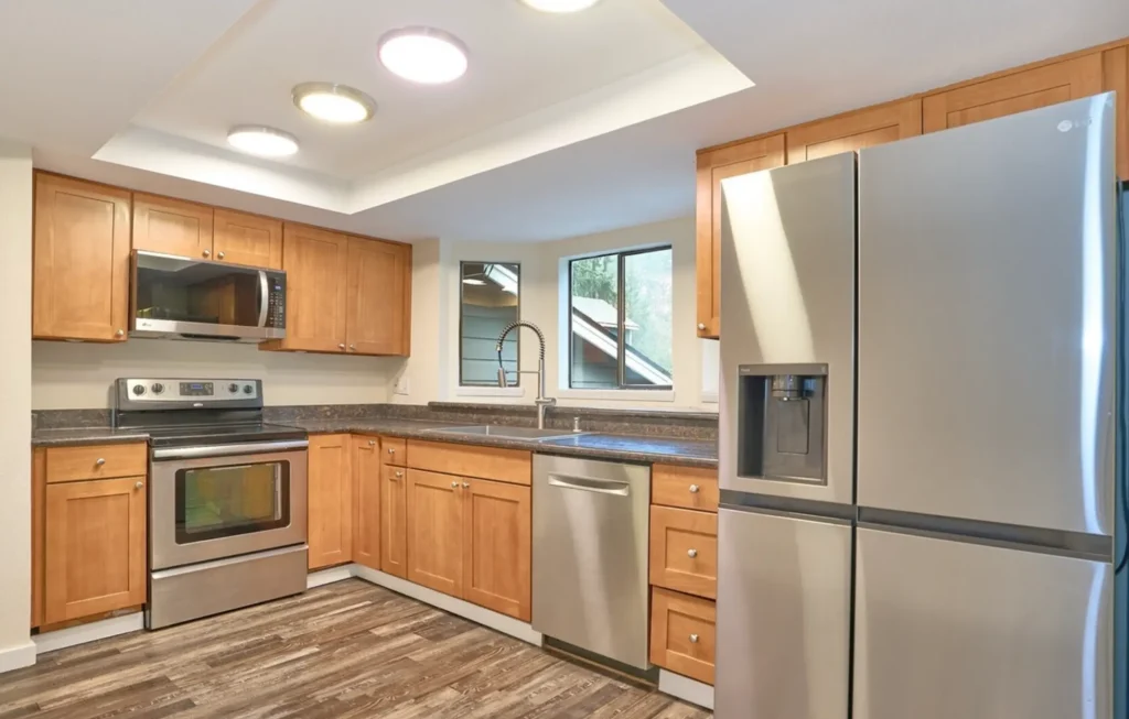Modern Kitchen Interior Painting and Cabinet Refresh Services Freshly painted interior room with smooth neutral walls